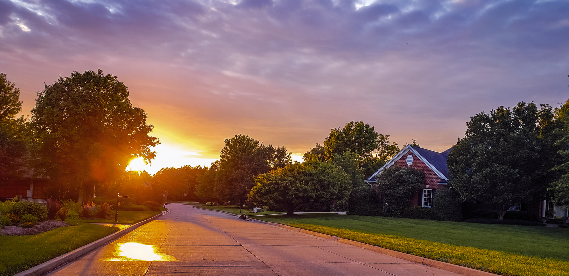 Midwestern neighborhood in early fall at sunset
